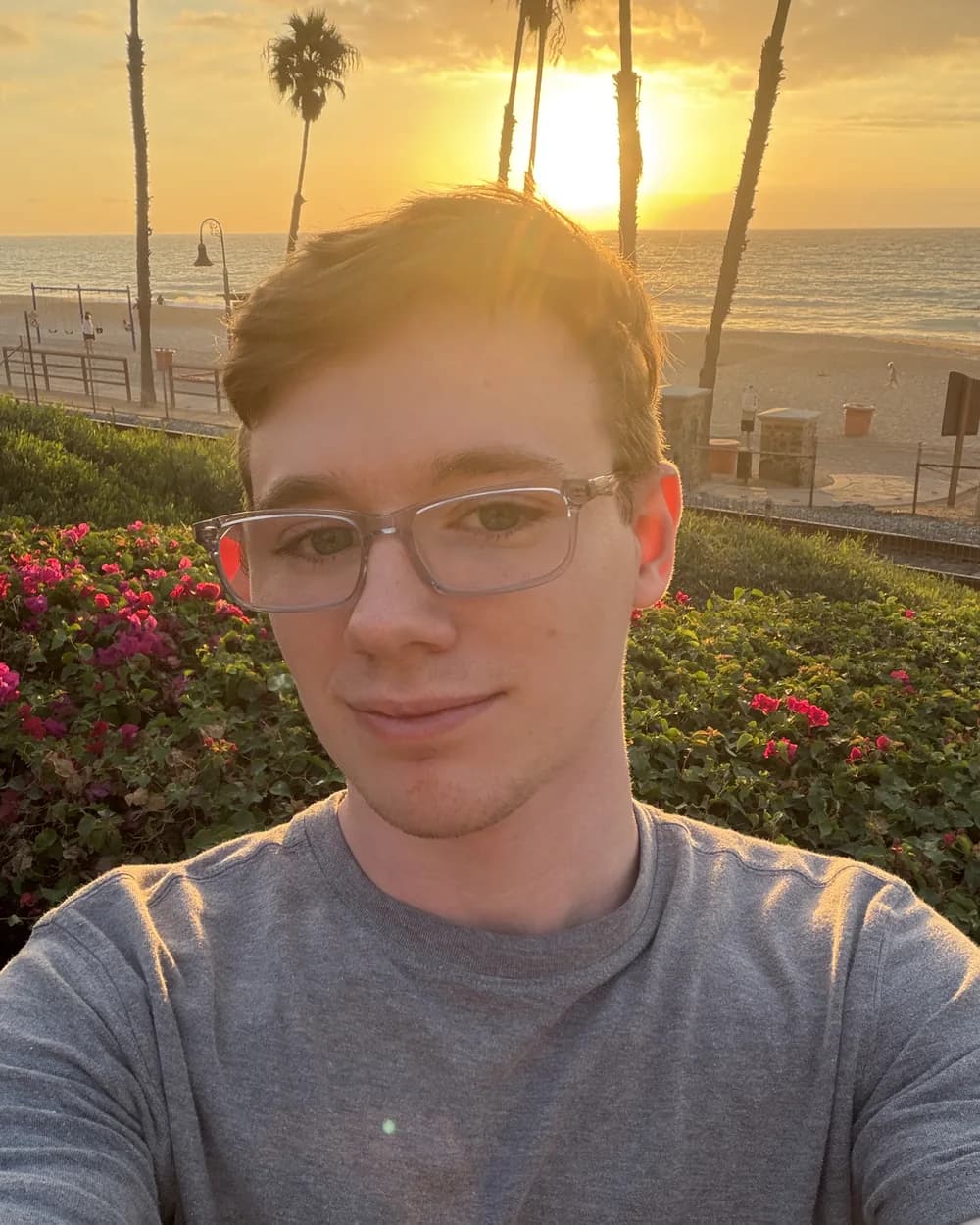 Ayden Springer at sunset by the beach